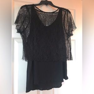 Jennifer Lopez double layered black lace top.